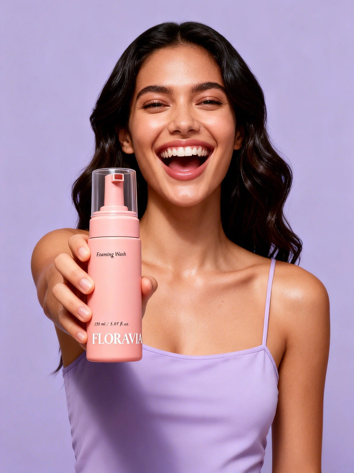 Woman holding Floravia Foaming Wash
