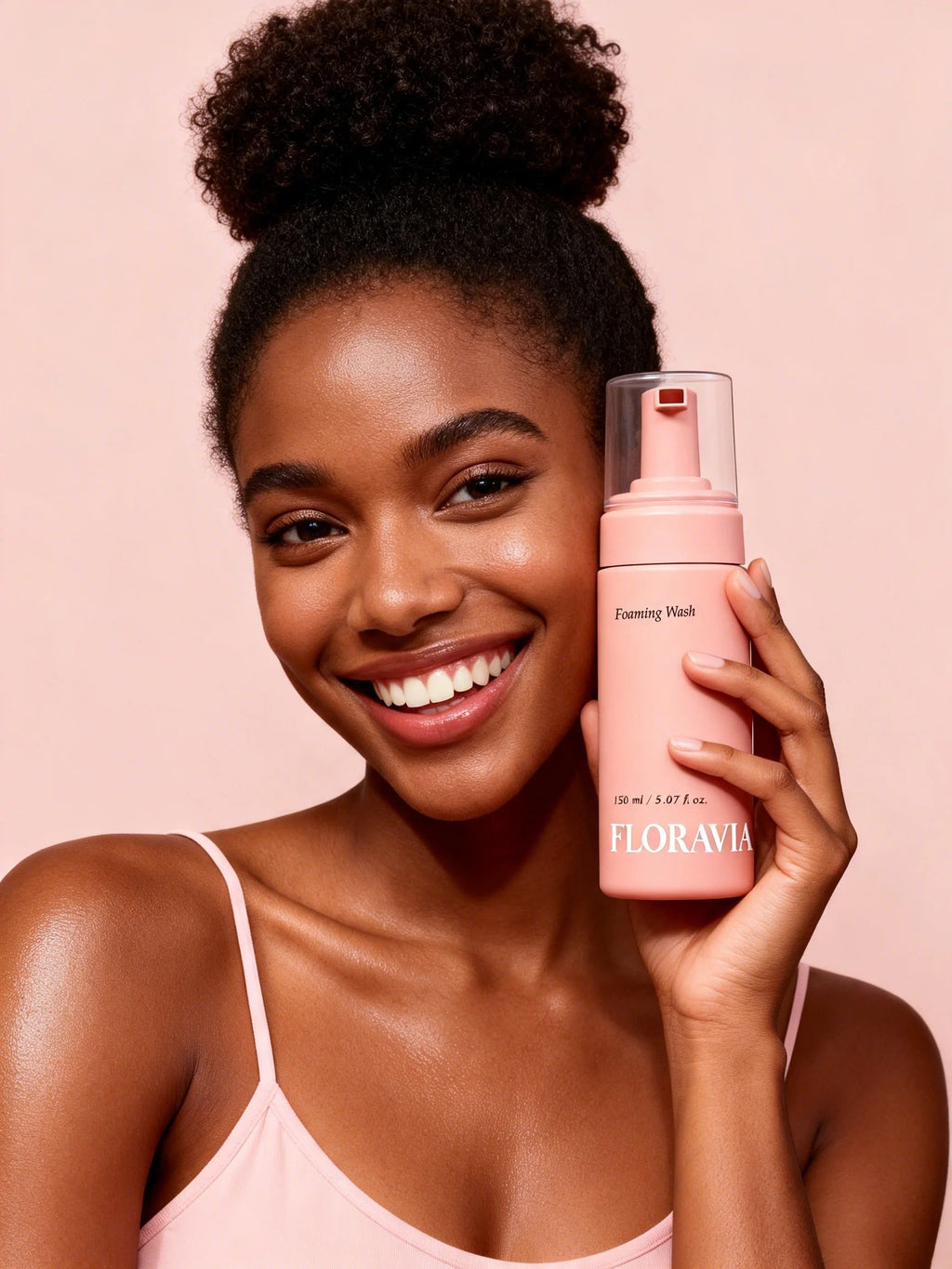 Woman holding Floravia Foaming Wash